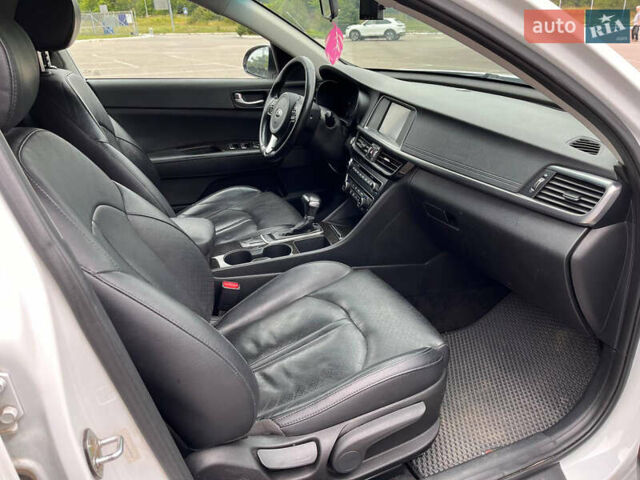 Білий Кіа Оптіма, об'ємом двигуна 2.36 л та пробігом 143 тис. км за 12000 $, фото 9 на Automoto.ua