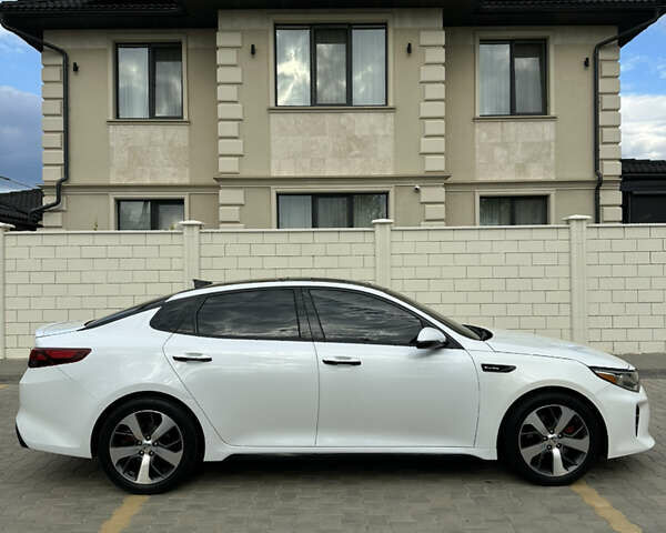 Білий Кіа Оптіма, об'ємом двигуна 2 л та пробігом 80 тис. км за 15900 $, фото 4 на Automoto.ua