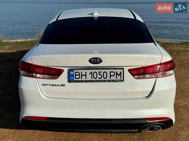 Білий Кіа Оптіма, об'ємом двигуна 2.4 л та пробігом 157 тис. км за 11500 $, фото 1 на Automoto.ua