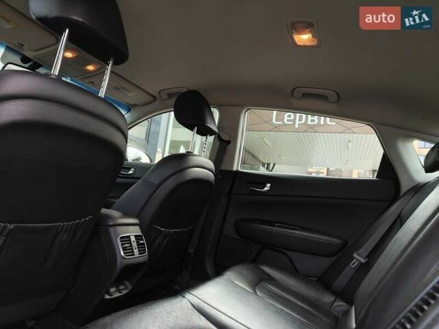 Белый Киа Оптима, объемом двигателя 2 л и пробегом 130 тыс. км за 16000 $, фото 1 на Automoto.ua