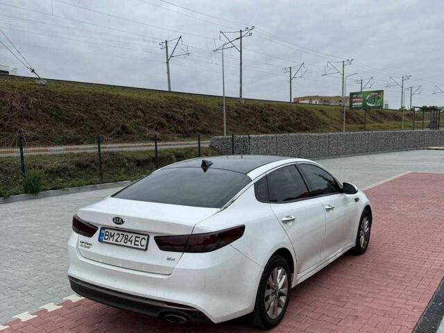 Белый Киа Оптима, объемом двигателя 2.4 л и пробегом 143 тыс. км за 12000 $, фото 1 на Automoto.ua