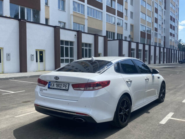 Белый Киа Оптима, объемом двигателя 2.36 л и пробегом 104 тыс. км за 12000 $, фото 3 на Automoto.ua