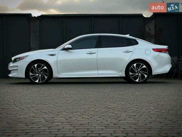 Белый Киа Оптима, объемом двигателя 2.36 л и пробегом 110 тыс. км за 12500 $, фото 7 на Automoto.ua