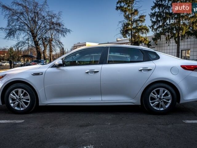 Білий Кіа Оптіма, об'ємом двигуна 2.36 л та пробігом 115 тис. км за 12000 $, фото 4 на Automoto.ua