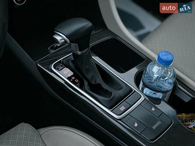 Білий Кіа Оптіма, об'ємом двигуна 2.36 л та пробігом 110 тис. км за 11550 $, фото 11 на Automoto.ua