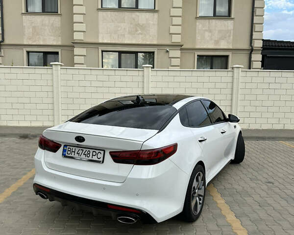 Білий Кіа Оптіма, об'ємом двигуна 2 л та пробігом 80 тис. км за 15900 $, фото 5 на Automoto.ua