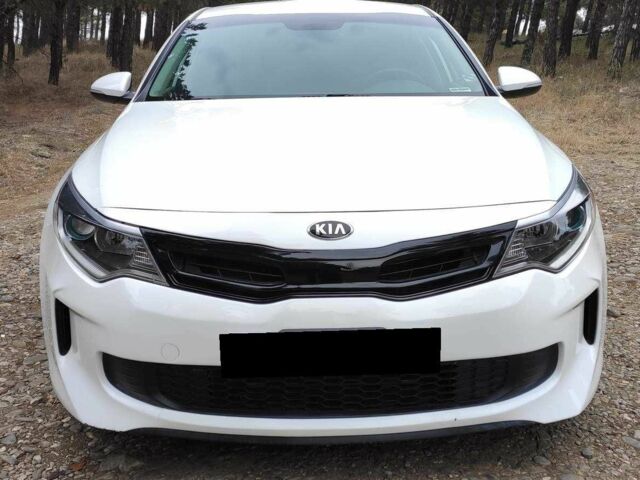 Белый Киа Оптима, объемом двигателя 2 л и пробегом 83 тыс. км за 9800 $, фото 1 на Automoto.ua