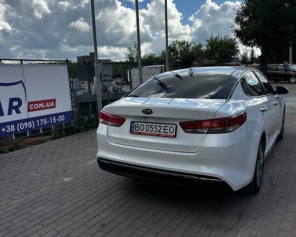 Білий Кіа Оптіма, об'ємом двигуна 2 л та пробігом 97 тис. км за 15490 $, фото 8 на Automoto.ua