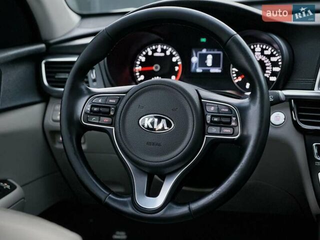 Білий Кіа Оптіма, об'ємом двигуна 2.36 л та пробігом 110 тис. км за 11550 $, фото 12 на Automoto.ua
