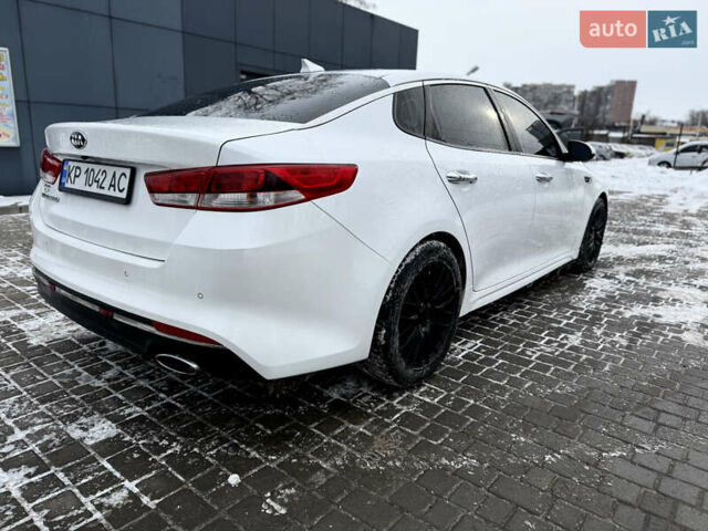 Белый Киа Оптима, объемом двигателя 2.36 л и пробегом 142 тыс. км за 10500 $, фото 4 на Automoto.ua