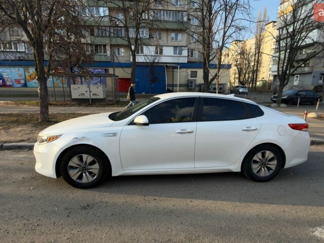 Білий Кіа Оптіма, об'ємом двигуна 2 л та пробігом 134 тис. км за 12700 $, фото 1 на Automoto.ua