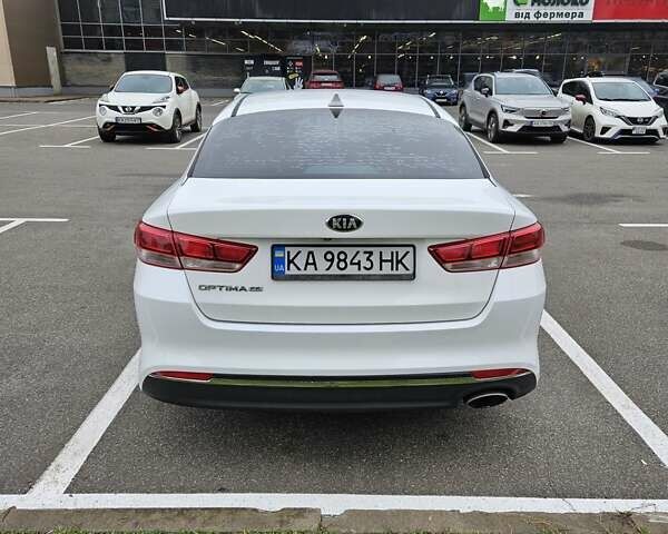 Білий Кіа Оптіма, об'ємом двигуна 2.36 л та пробігом 197 тис. км за 11000 $, фото 10 на Automoto.ua