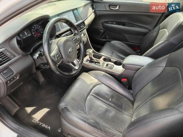 Белый Киа Оптима, объемом двигателя 2 л и пробегом 130 тыс. км за 16000 $, фото 27 на Automoto.ua