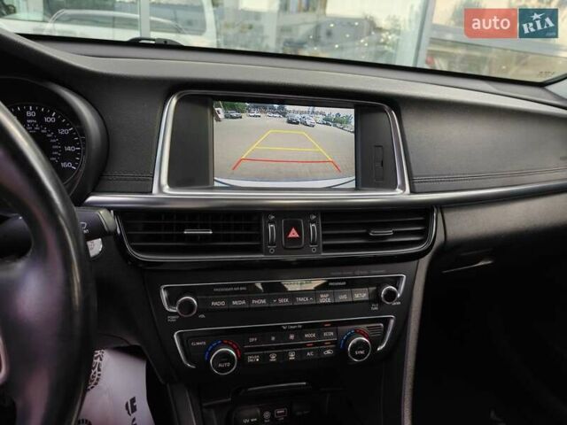 Белый Киа Оптима, объемом двигателя 2 л и пробегом 130 тыс. км за 16000 $, фото 5 на Automoto.ua