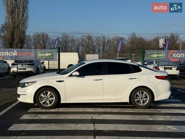 Белый Киа Оптима, объемом двигателя 2.36 л и пробегом 170 тыс. км за 10900 $, фото 6 на Automoto.ua