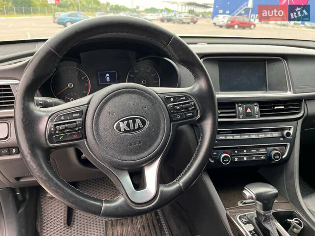 Білий Кіа Оптіма, об'ємом двигуна 2.36 л та пробігом 143 тис. км за 12000 $, фото 10 на Automoto.ua