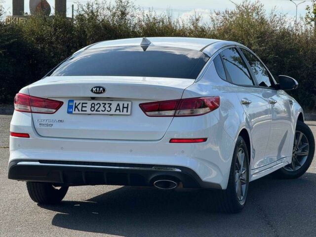 Білий Кіа Оптіма, об'ємом двигуна 2.4 л та пробігом 120 тис. км за 10200 $, фото 7 на Automoto.ua