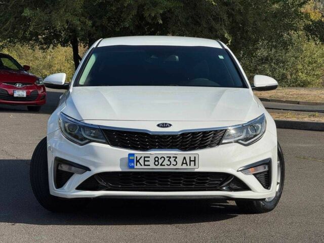 Білий Кіа Оптіма, об'ємом двигуна 2.4 л та пробігом 120 тис. км за 10200 $, фото 1 на Automoto.ua