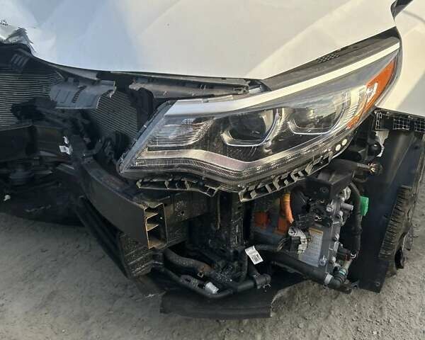 Белый Киа Оптима, объемом двигателя 2 л и пробегом 65 тыс. км за 11500 $, фото 13 на Automoto.ua
