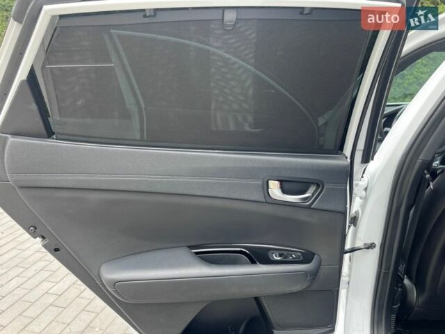 Белый Киа Оптима, объемом двигателя 2 л и пробегом 80 тыс. км за 17400 $, фото 24 на Automoto.ua