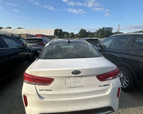 Белый Киа Оптима, объемом двигателя 2 л и пробегом 66 тыс. км за 11500 $, фото 33 на Automoto.ua