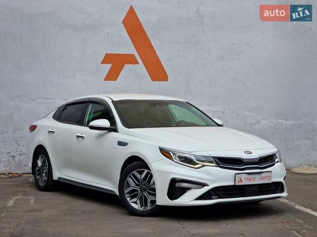 Белый Киа Оптима, объемом двигателя 2 л и пробегом 70 тыс. км за 19490 $, фото 8 на Automoto.ua