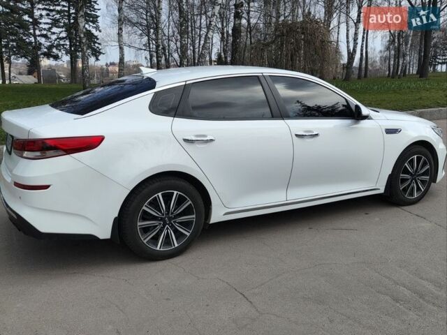 Білий Кіа Оптіма, об'ємом двигуна 1.6 л та пробігом 262 тис. км за 13950 $, фото 7 на Automoto.ua