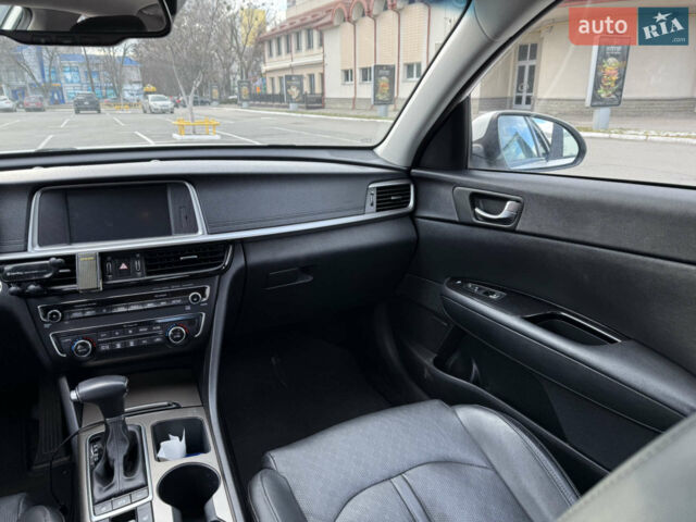 Білий Кіа Оптіма, об'ємом двигуна 2 л та пробігом 129 тис. км за 18800 $, фото 21 на Automoto.ua