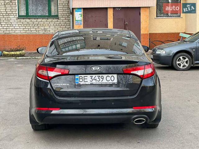 Черный Киа Оптима, объемом двигателя 2 л и пробегом 250 тыс. км за 9000 $, фото 9 на Automoto.ua