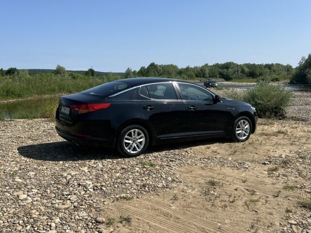 Черный Киа Оптима, объемом двигателя 2 л и пробегом 138 тыс. км за 9100 $, фото 3 на Automoto.ua