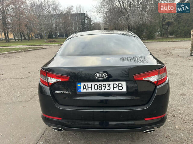 Черный Киа Оптима, объемом двигателя 2.4 л и пробегом 210 тыс. км за 9500 $, фото 5 на Automoto.ua