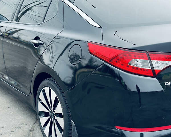 Черный Киа Оптима, объемом двигателя 2.36 л и пробегом 210 тыс. км за 9900 $, фото 6 на Automoto.ua