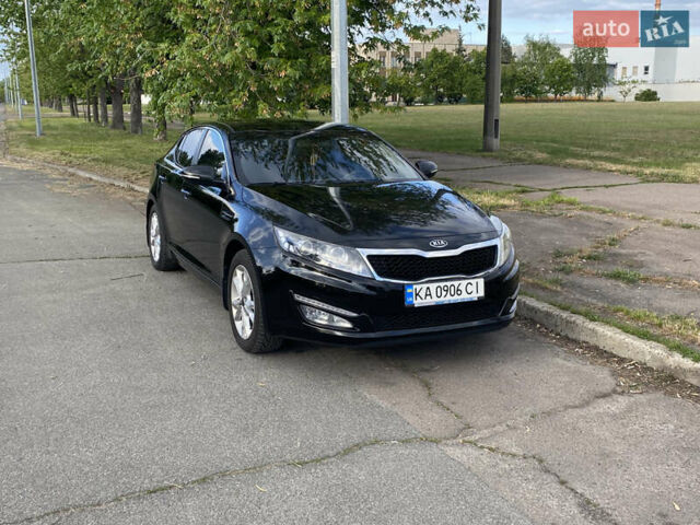 Черный Киа Оптима, объемом двигателя 2 л и пробегом 164 тыс. км за 10500 $, фото 1 на Automoto.ua