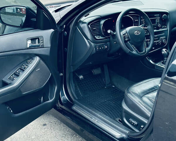 Черный Киа Оптима, объемом двигателя 2.36 л и пробегом 210 тыс. км за 9900 $, фото 11 на Automoto.ua