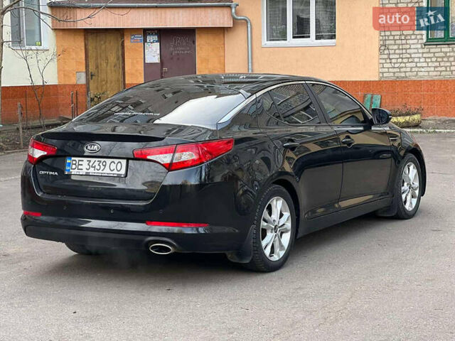 Черный Киа Оптима, объемом двигателя 2 л и пробегом 250 тыс. км за 9000 $, фото 10 на Automoto.ua