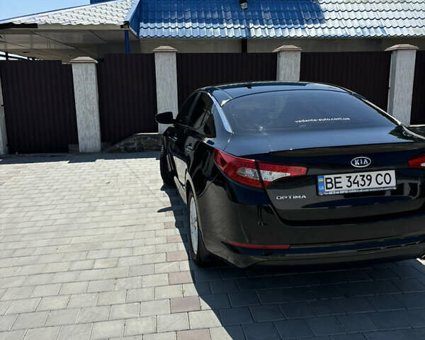 Черный Киа Оптима, объемом двигателя 2 л и пробегом 250 тыс. км за 9000 $, фото 1 на Automoto.ua