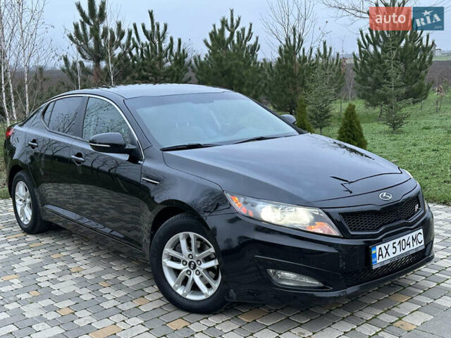 Черный Киа Оптима, объемом двигателя 2.36 л и пробегом 201 тыс. км за 7600 $, фото 6 на Automoto.ua