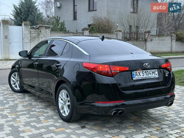 Черный Киа Оптима, объемом двигателя 2.36 л и пробегом 201 тыс. км за 7600 $, фото 13 на Automoto.ua
