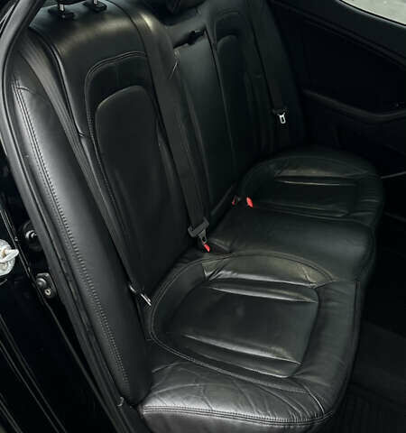 Черный Киа Оптима, объемом двигателя 2.36 л и пробегом 210 тыс. км за 9900 $, фото 22 на Automoto.ua