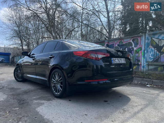 Чорний Кіа Оптіма, об'ємом двигуна 2 л та пробігом 210 тис. км за 9800 $, фото 6 на Automoto.ua