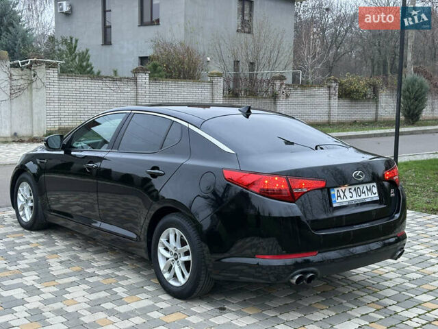 Черный Киа Оптима, объемом двигателя 2.36 л и пробегом 201 тыс. км за 7600 $, фото 16 на Automoto.ua