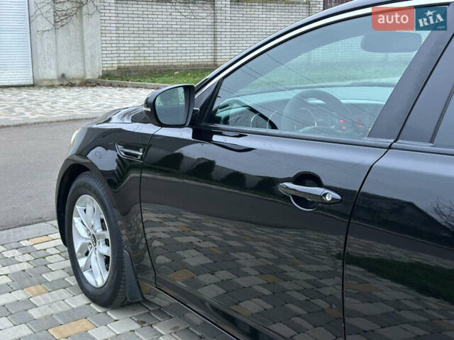 Черный Киа Оптима, объемом двигателя 2.36 л и пробегом 201 тыс. км за 7600 $, фото 19 на Automoto.ua