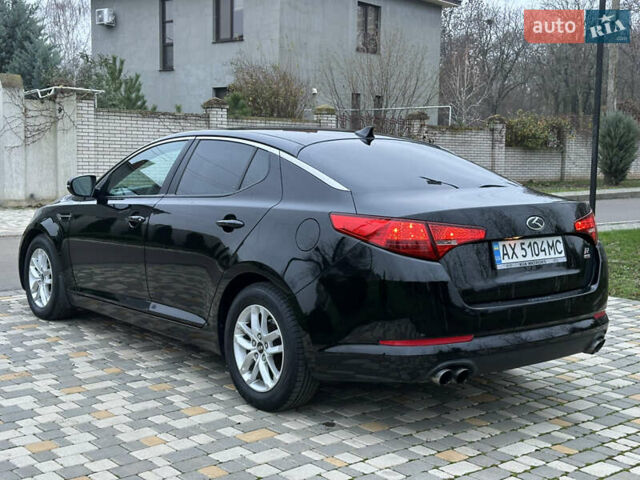 Черный Киа Оптима, объемом двигателя 2.36 л и пробегом 201 тыс. км за 7600 $, фото 17 на Automoto.ua