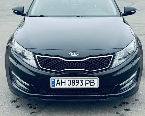 Черный Киа Оптима, объемом двигателя 2.36 л и пробегом 210 тыс. км за 9900 $, фото 3 на Automoto.ua