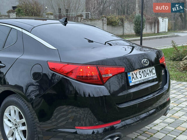Черный Киа Оптима, объемом двигателя 2.36 л и пробегом 201 тыс. км за 7600 $, фото 20 на Automoto.ua