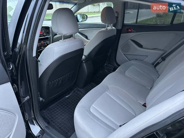 Черный Киа Оптима, объемом двигателя 2.36 л и пробегом 201 тыс. км за 7600 $, фото 31 на Automoto.ua