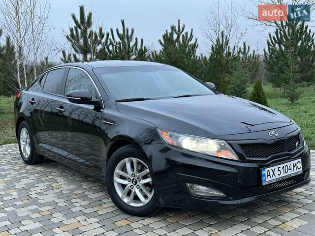 Черный Киа Оптима, объемом двигателя 2.36 л и пробегом 201 тыс. км за 7600 $, фото 5 на Automoto.ua