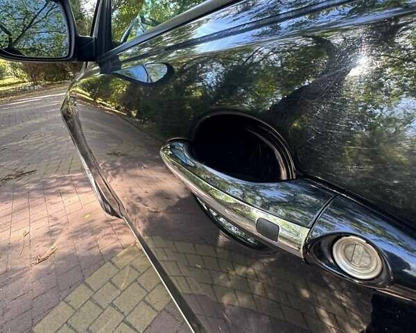 Чорний Кіа Оптіма, об'ємом двигуна 2.36 л та пробігом 160 тис. км за 8800 $, фото 2 на Automoto.ua