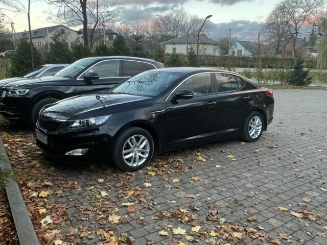 Черный Киа Оптима, объемом двигателя 2 л и пробегом 138 тыс. км за 9100 $, фото 1 на Automoto.ua