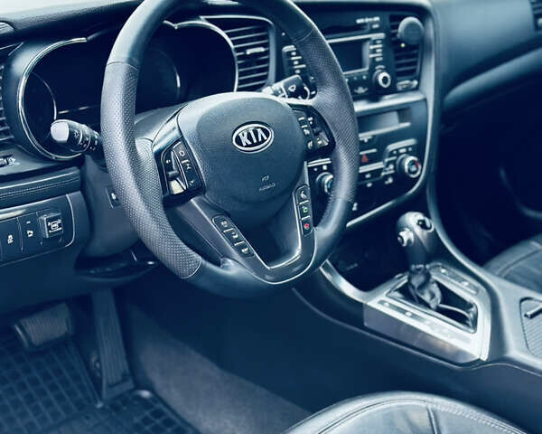 Черный Киа Оптима, объемом двигателя 2.36 л и пробегом 210 тыс. км за 9900 $, фото 13 на Automoto.ua